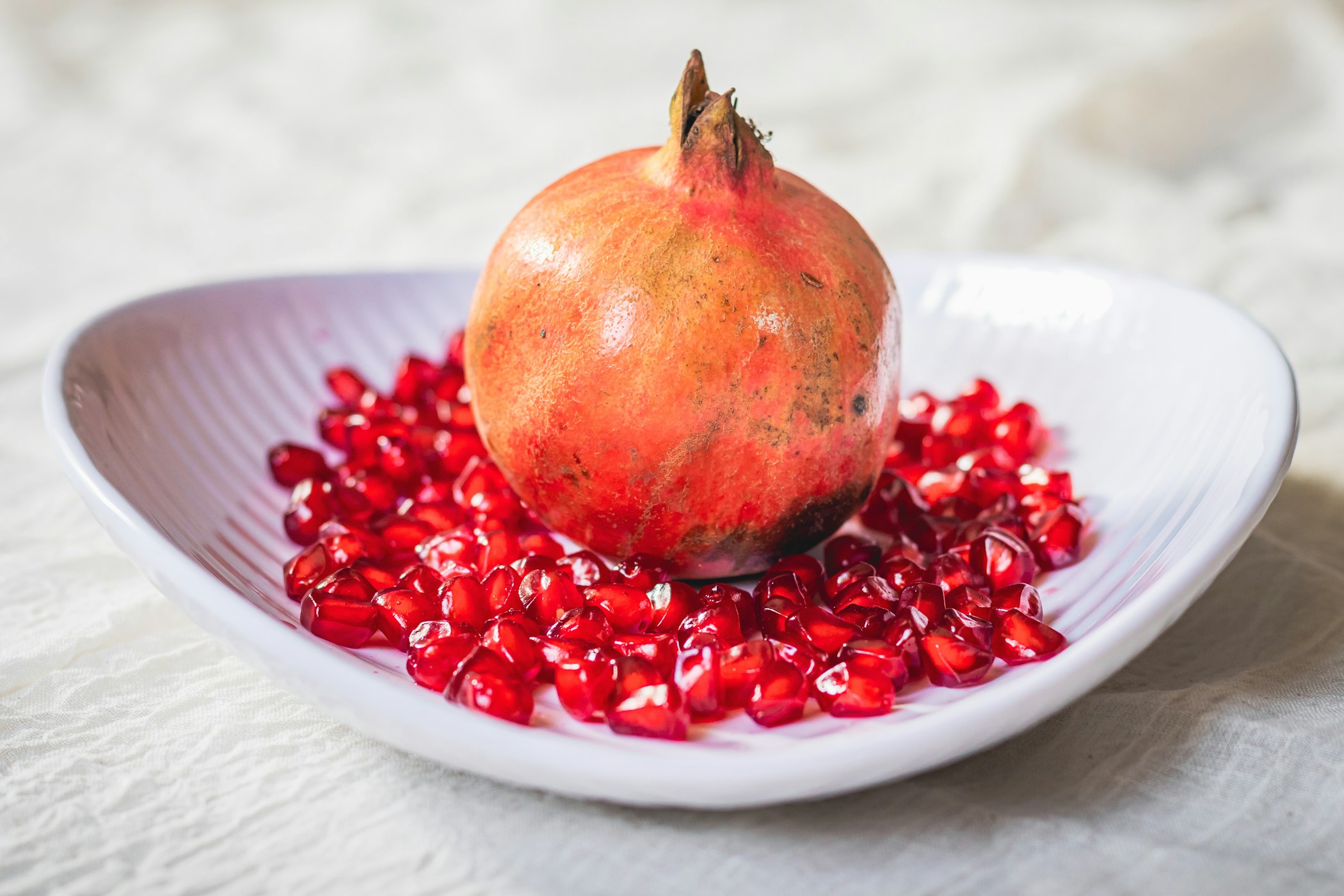 Pomegranate and its red seeds