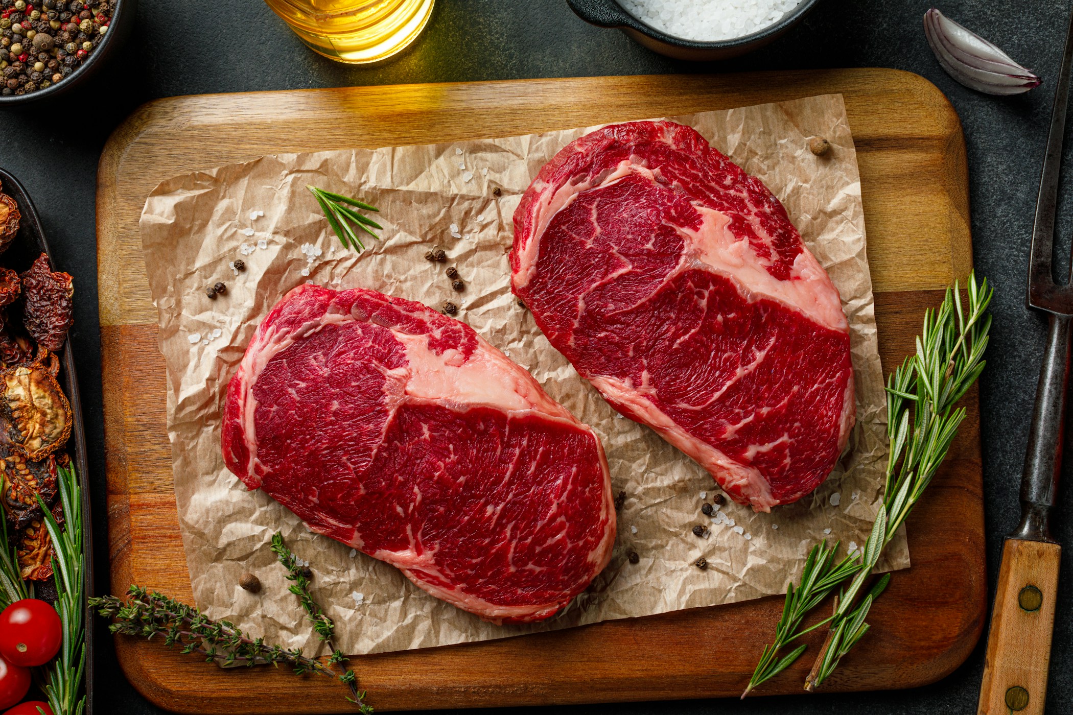 Raw fillet pork or beef steak pieces closeup top view